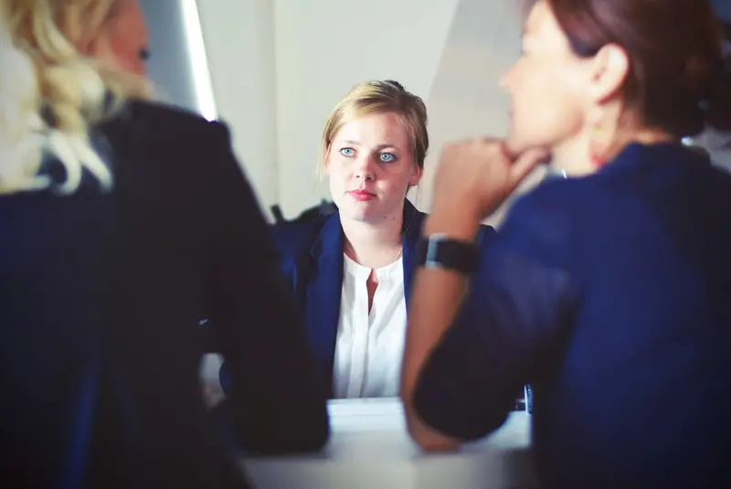 Three colleagues in a meeting